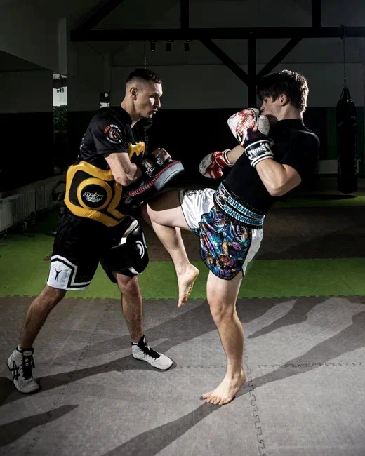 Maksym Chumak — pad work with a student